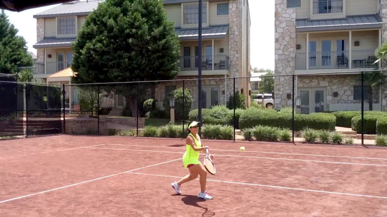 Video thumbnail showing: A senior man playing tennis misses his swing and loses his balance, stumbling backwards before falling.
