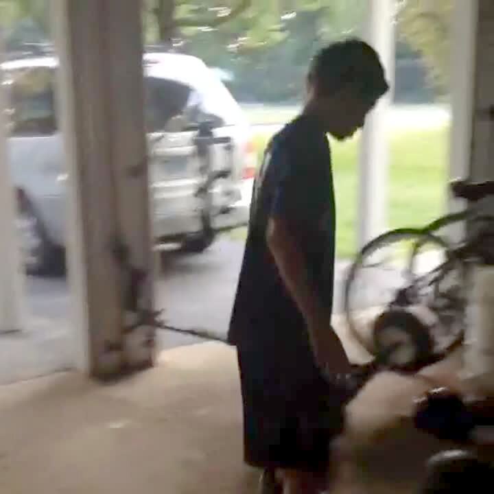 Video thumbnail showing: A boy on roller blades loses his balance and falls in a garage.