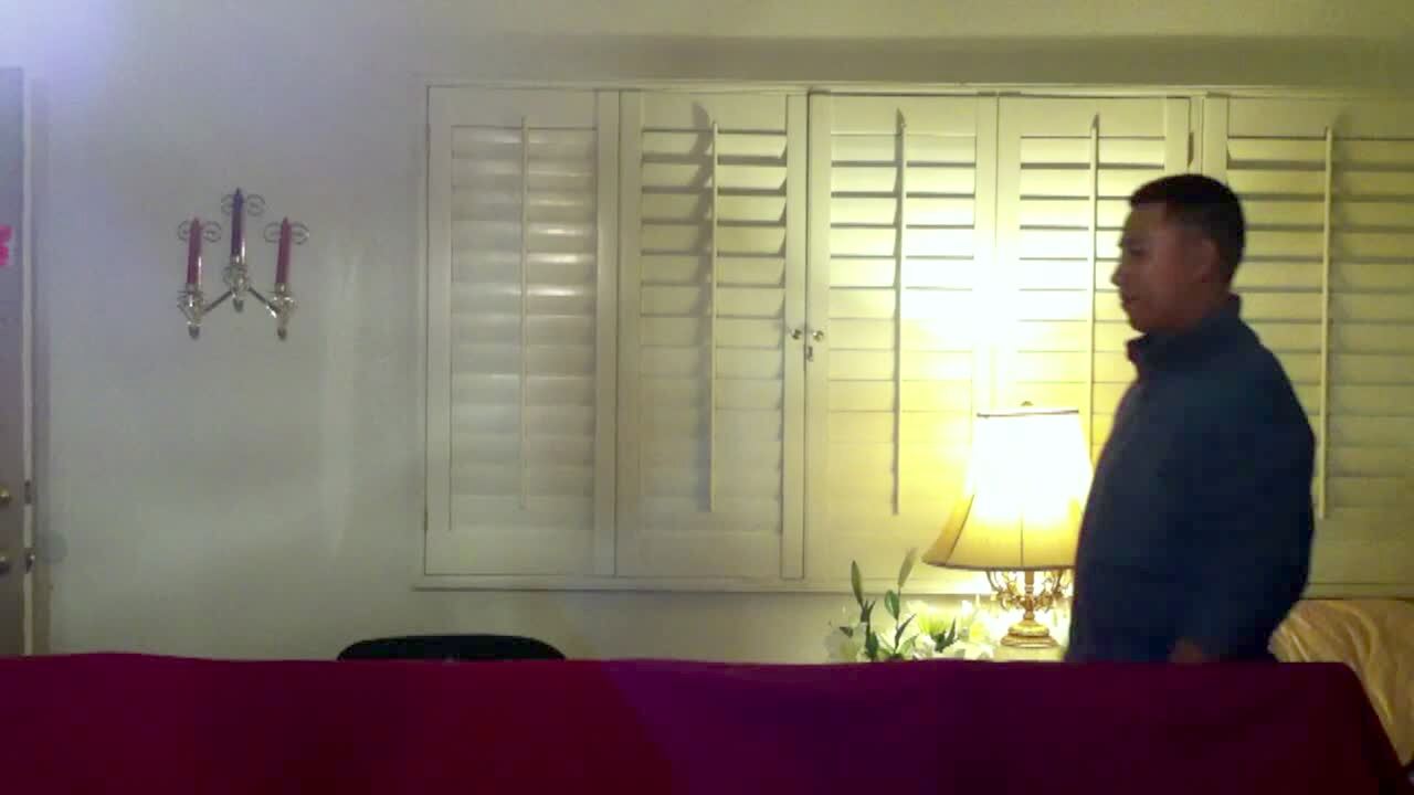 Video thumbnail showing: A man demonstrates a fake staircase and escalator behind a couch. When he attempts a fake elevator, he falls into the table behind him.